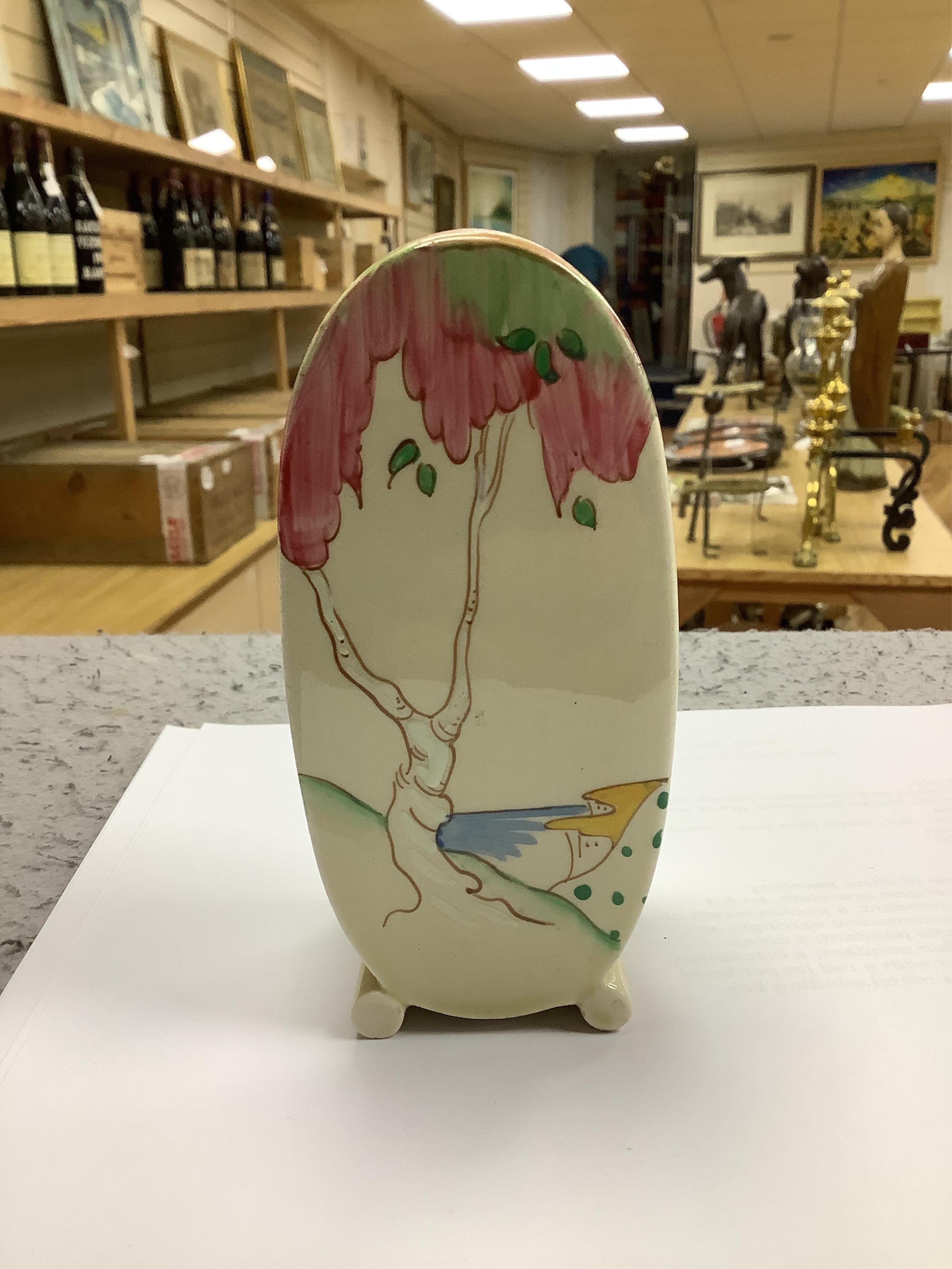A Clarice Cliff Bonjour shaped sugar sifter, 12.5cm high. Condition - good